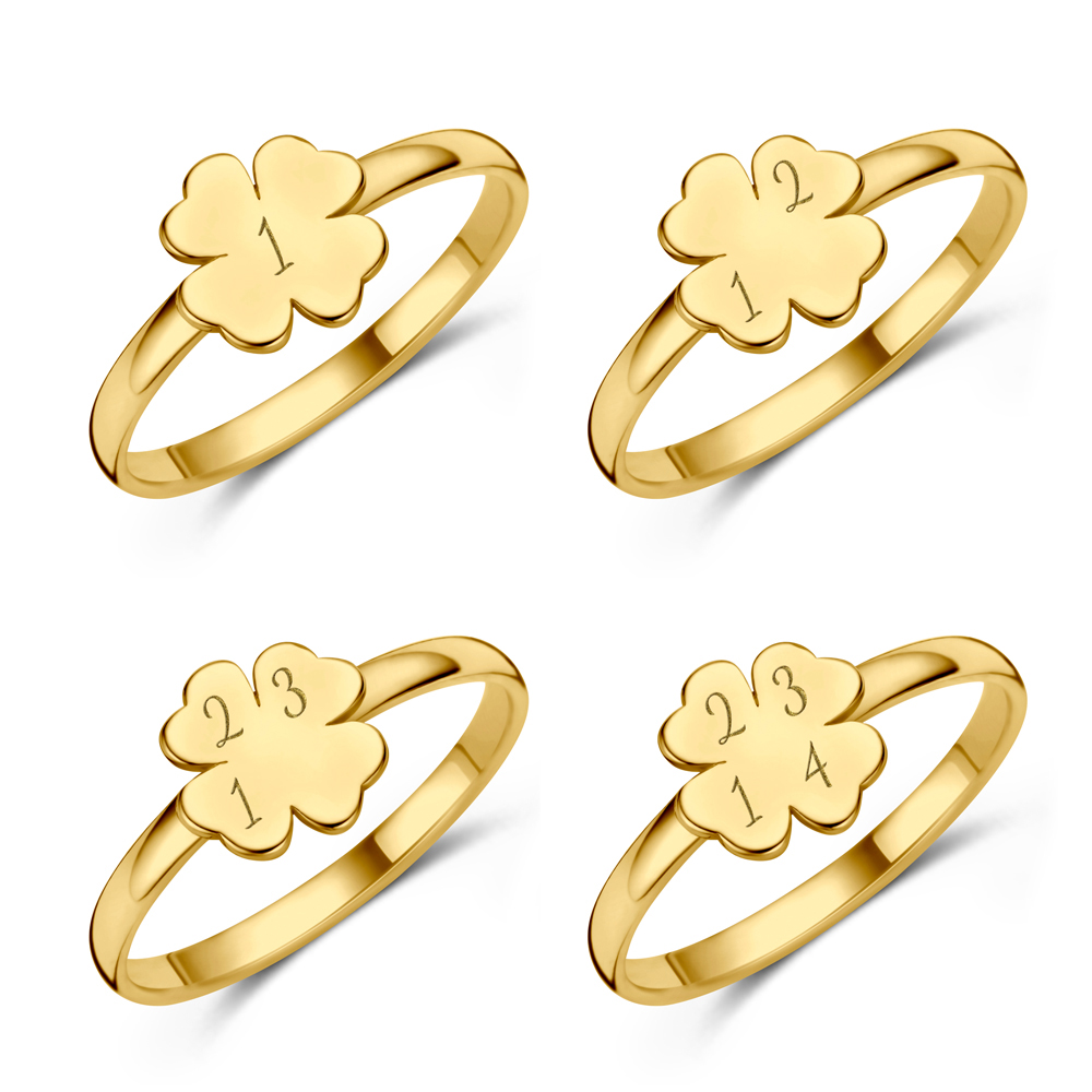 Anillo de oro con trébol e iniciales