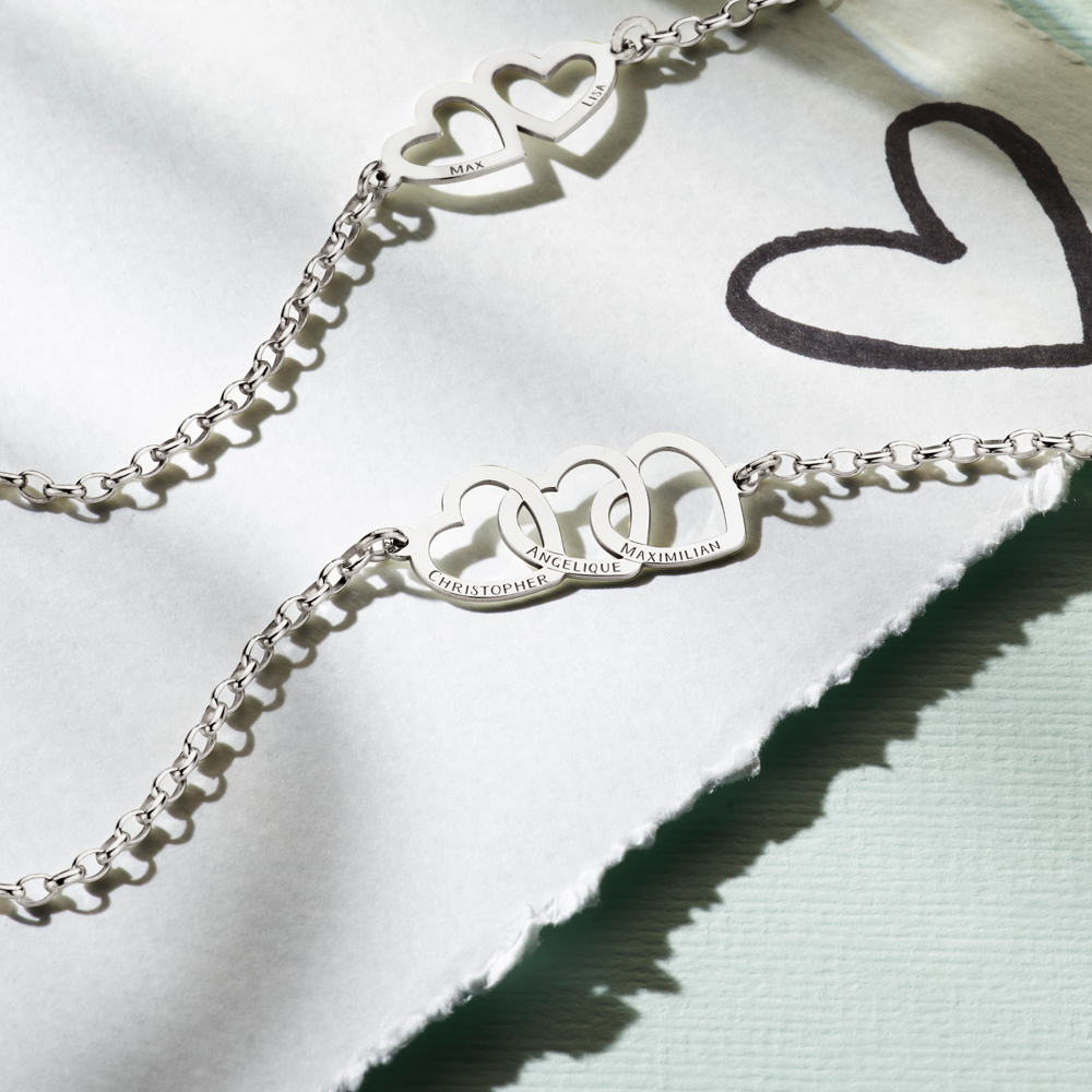 Pulsera de plata con tres corazones unidos y nombres Pulsera de plata con tres corazones unidos y nombres