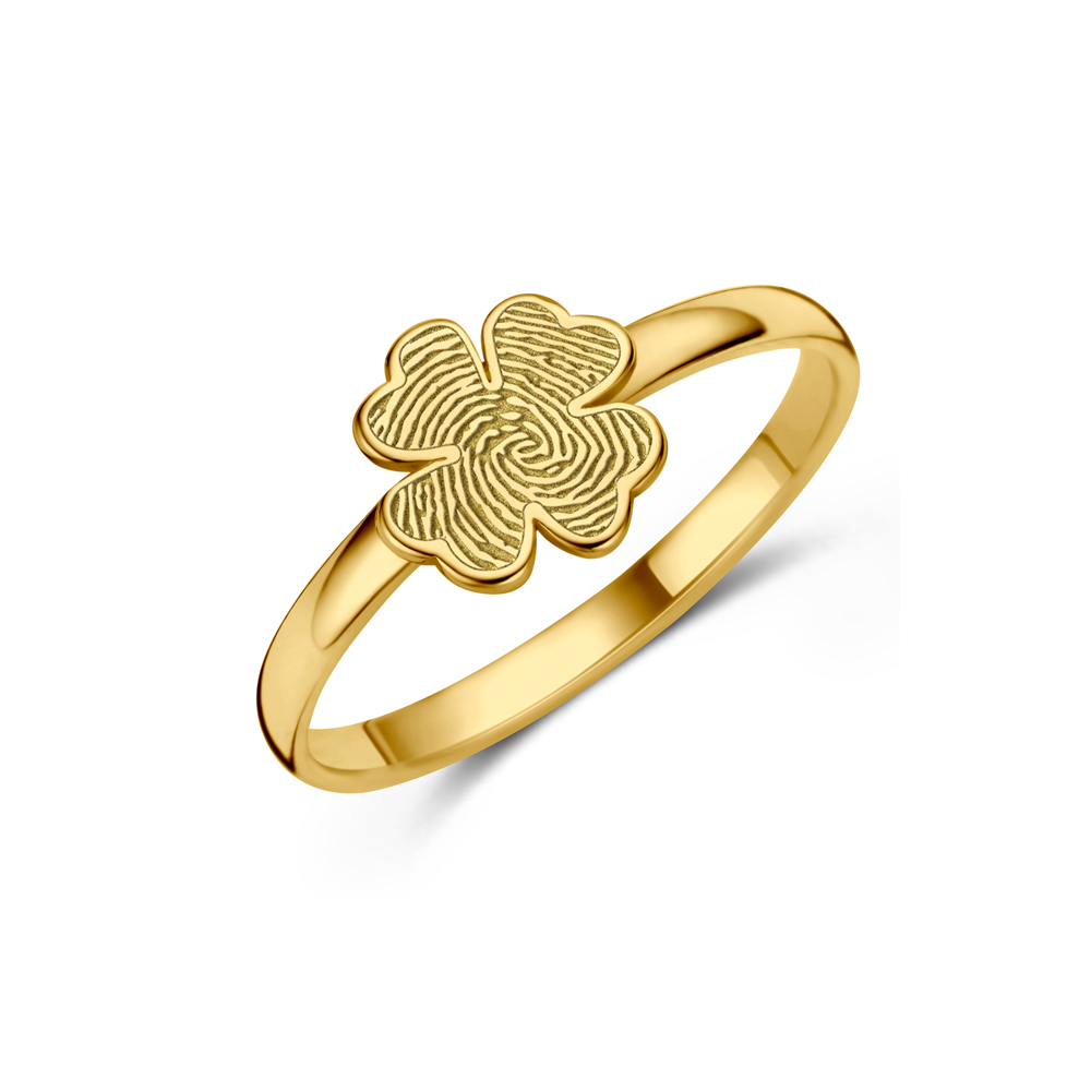 Anillo de oro con trébol y huella dactilar