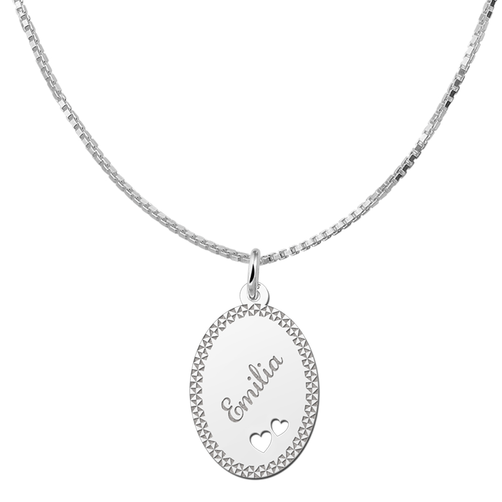 Colgante ovalado de plata borde & dos corazones