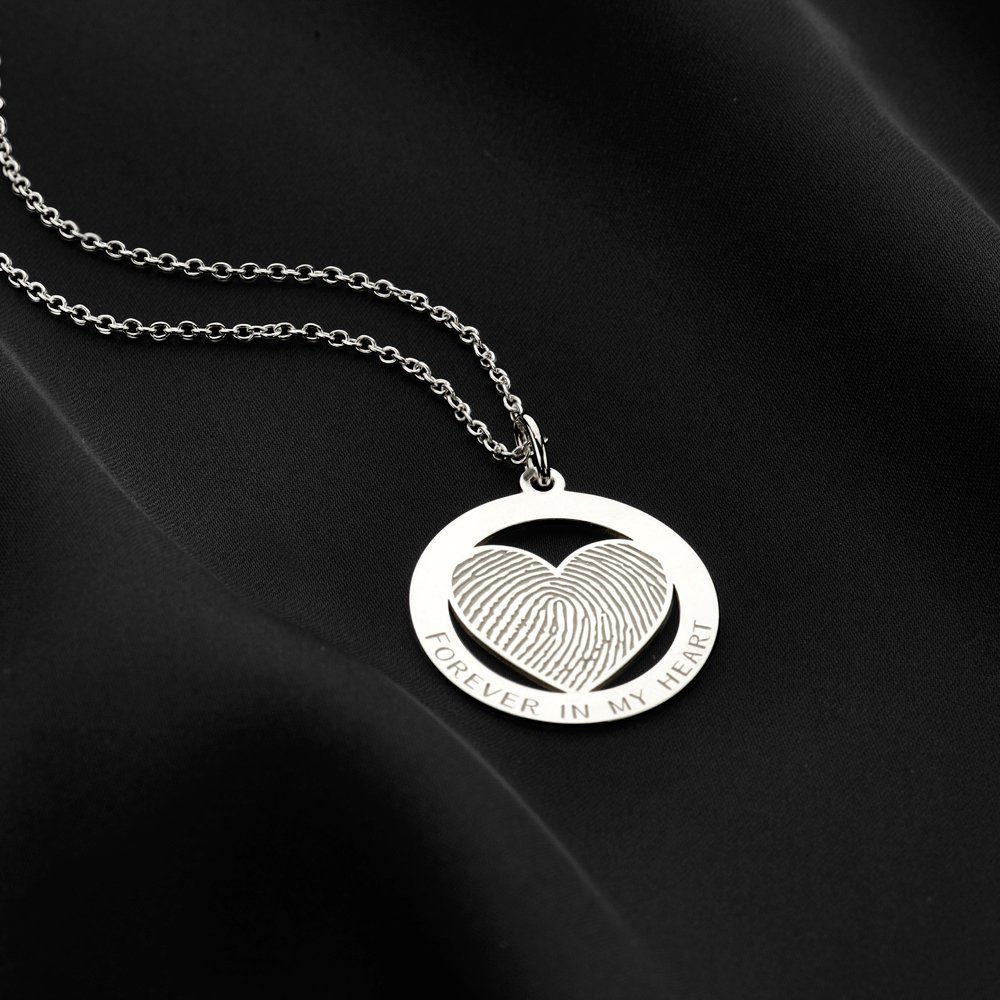 Colgante de plata con huella dactilar en forma de corazón