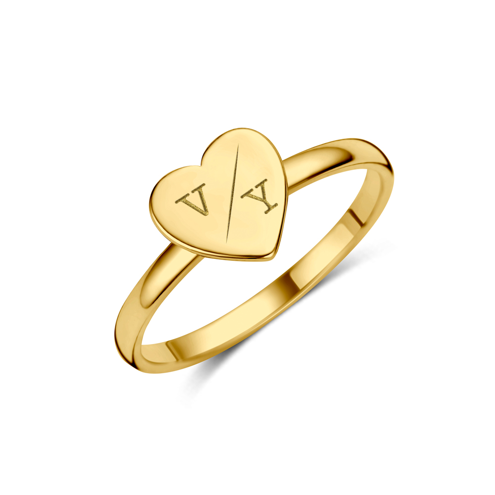 Anillo de oro con trébol y huella dactilar