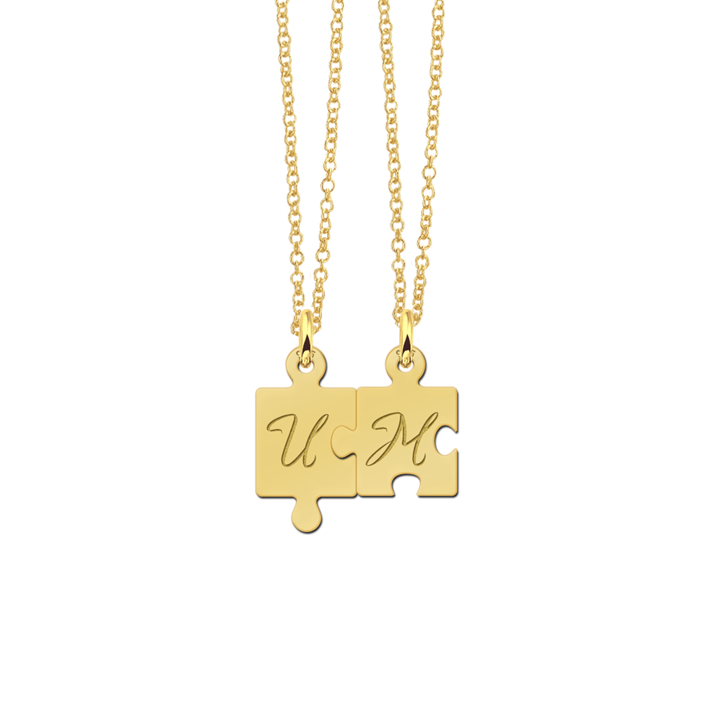 Colgantes de pieza de puzzle chapados en oro con iniciales